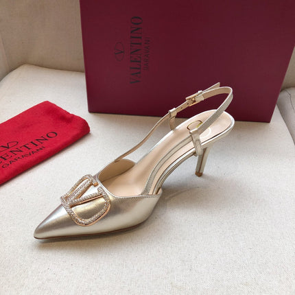 VLOGO SIGNATURE SILVER PATENT LEATHER SLINGBACK PUMP