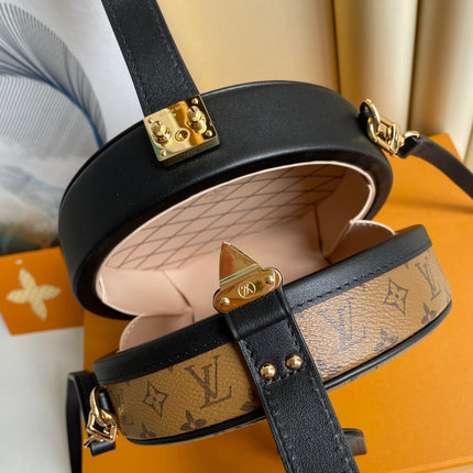 LV 25S PETITE BOITE CHAPEAU 17 IN BLACK MONOGRAM REVERSE CALFSKIN