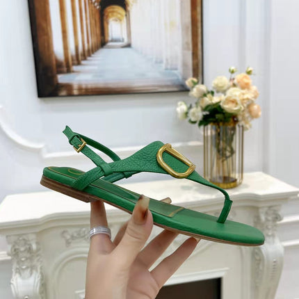 THONG SANDALS IN EMERALD GREEN CALFSKIN WITH GOLD LOGO