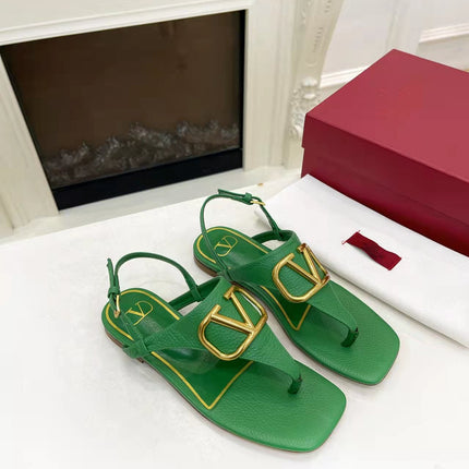 THONG SANDALS IN EMERALD GREEN CALFSKIN WITH GOLD LOGO
