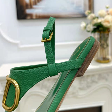 THONG SANDALS IN EMERALD GREEN CALFSKIN WITH GOLD LOGO