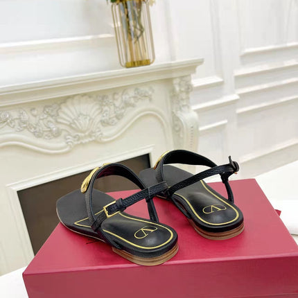 THONG SANDALS IN BLACK CALFSKIN WITH GOLD LOGO