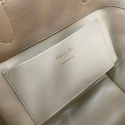 MEDIUM TOUJOURS BUCKET BAG 22 IN BEIGE CANNAGE CALFSKIN