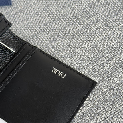 VERTICAL BIFOLD WALLET 19 IN BLACK GRAINED CALFSKIN MIX BLUE MONOGRAM OBLIQUE JACQUARD