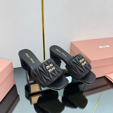 MATELASSÉ SLIDES PUMP IN BLACK CALFSKIN