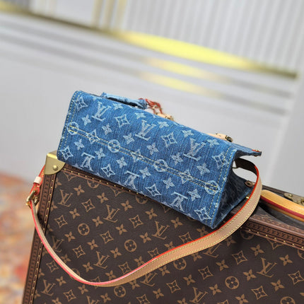 LV 25S ONTHEGO 28 IN BLUE MONOGRAM DENIM COTTON CALFSKIN LEATHER STRAP