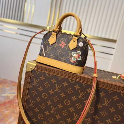 LV 25S NANO ALMA 18 IN BROWN MONOGRAM CANVAS PRINTED WITH THE VIVIENNE MASCOT