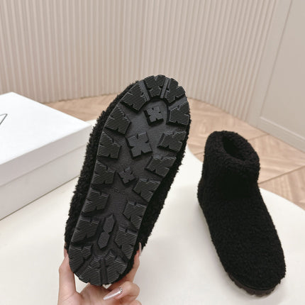 SNOW ANKLE BOOTS IN BLACK SHEARLING