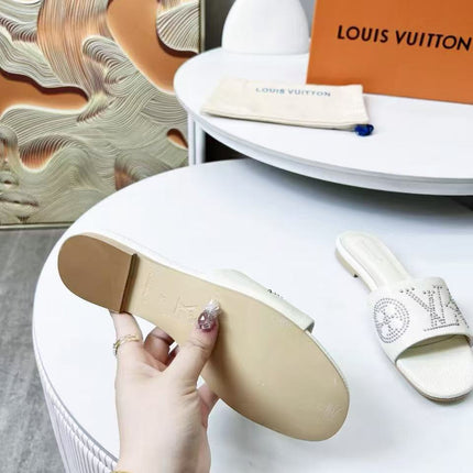 FLAT SLIDE IN WHITE LAMBSKIN WITH RHINSTONES