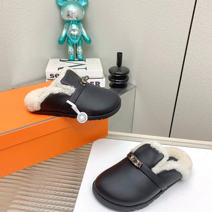 SLIP-ON MULE IN BLACK CALFSKIN AND SHEARLING LINING