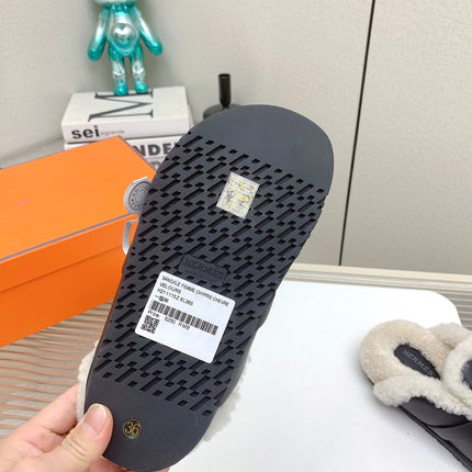 SLIP-ON MULE IN BLACK CALFSKIN AND SHEARLING LINING