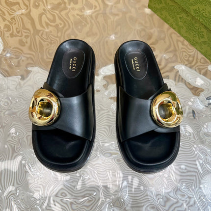WOMEN'S SLIPPER IN BLACK CALFSKIN WITH GOLD HARDWARE