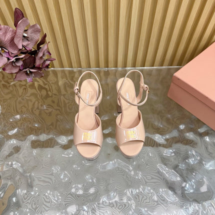 PLATFORM HEELS IN LADY PINK PATENT CALFSKIN GOLD LOGO IN STRAP