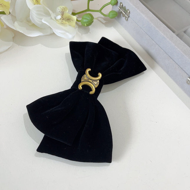 BLACK VELVET WITH GOLD LOGO HAIRPIN 387059