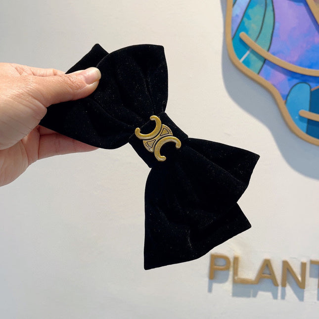 BLACK VELVET WITH GOLD LOGO HAIRPIN 387059