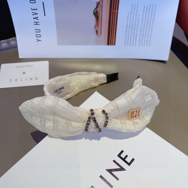 WHITE CREAM VOILE FABRIC WITH GOLD LOGO 391641