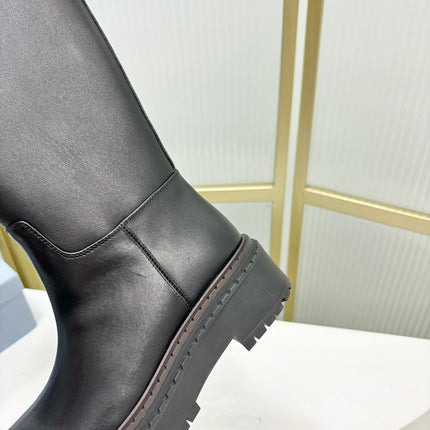 KNEE BOOTS WITH TRIANGLE LOGO IN BLACK CALFSKIN