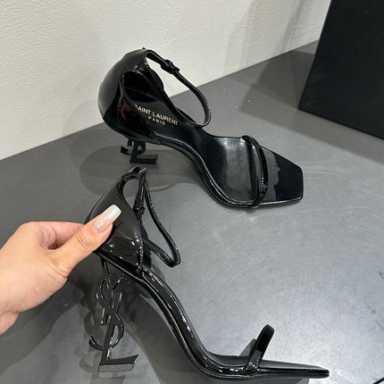 YSL HEELED SANDALS 25S 105 MM IN BLACK GLOSSY LAMBSKIN