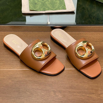 FLAT MULE IN BRONE BROWN CALFSKIN WITH GOLD HARDWARE