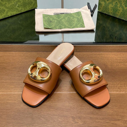 FLAT MULE IN BRONE BROWN CALFSKIN WITH GOLD HARDWARE