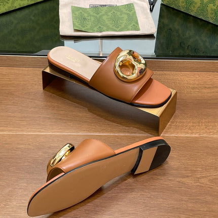 FLAT MULE IN BRONE BROWN CALFSKIN WITH GOLD HARDWARE