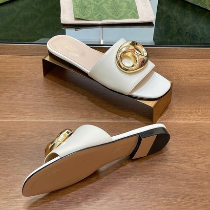 FLAT MULE IN WHITE CALFSKIN WITH GOLD HARDWARE