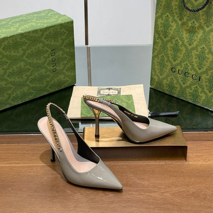 GG HIGH SLINGBACK 10.5 CM IN DOVE GREY GLOSSY CALFSKIN WITH GOLD HARDWARE