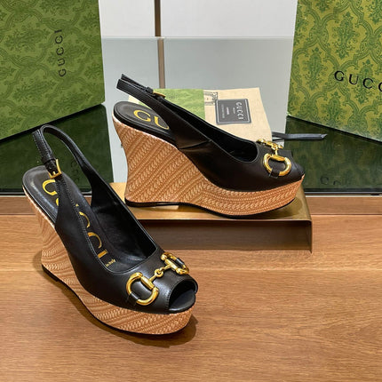 GG WEDGE PLATFORM IN BLACK CALFSKIN WITH GOLD HARDWARE