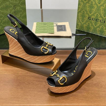 GG WEDGE PLATFORM IN BLACK CALFSKIN WITH GOLD HARDWARE