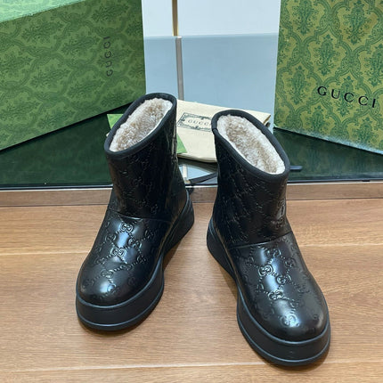 GG UGG BOOTS IN BLACK EMBOSSED SUEDE AND BEIGE WOOL LINING