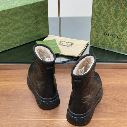 GG UGG BOOTS IN BLACK EMBOSSED DEERSKIN AND BEIGE WOOL LINING