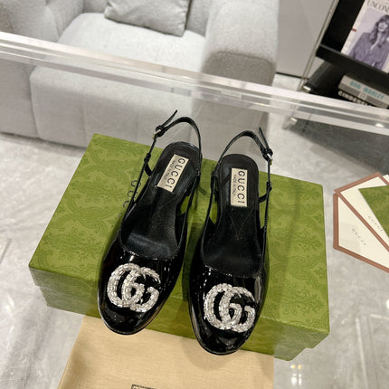 METALIC SLINGBACK FLATS IN BLACK CALFSKIN