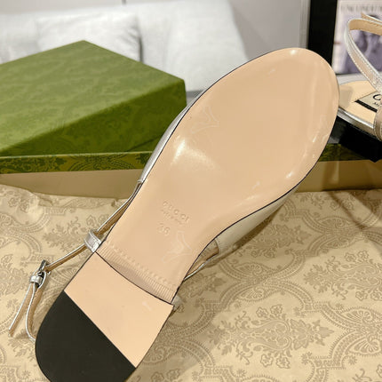 METALIC SLINGBACK FLATS IN SILVER CALFSKIN