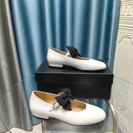 MARY JANE SHOES WHITE SHEEPSKIN WITH BLACK BOW