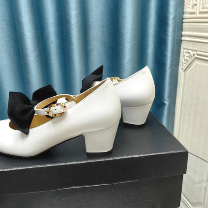 HIGH MARY JANE SHOES WHITE SHEEPSKIN WITH BLACK BOW