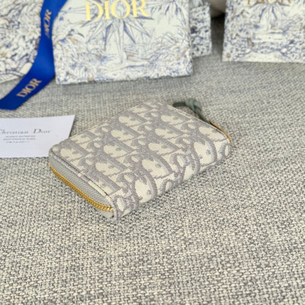 MONTAIGNE VOYAGEUR COIN PURSE 12 IN GREY MONOGRAM OBLIQUE JACQUARD