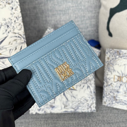 FREESIA CARD HOLDER 10 IN BABY BLUE QUILTED ALLOVER CALFSKIN