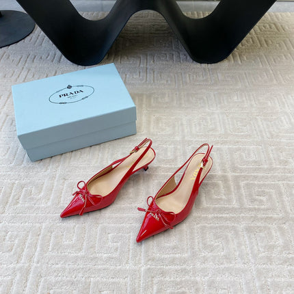 SLINGBACK PUMPS ATTACHED BOW IN PASSION RED GLOSSY CALFSKIN