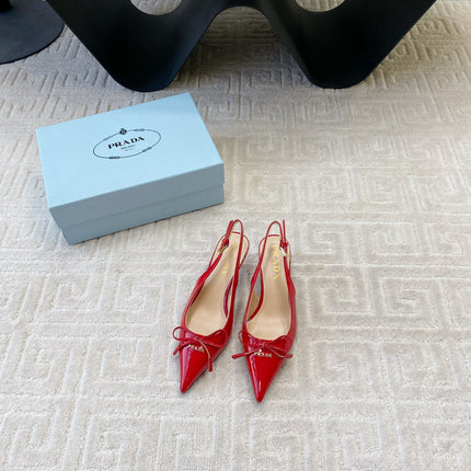 SLINGBACK PUMPS ATTACHED BOW IN PASSION RED GLOSSY CALFSKIN