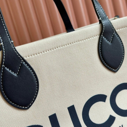 TOTE BAG PRINTED LOGO 41.5 IN WHITE CANVAS DARK BLUE CALFSKIN