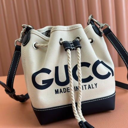 SMALL DRAWSTRING SHOULDER BAG 21 IN WHITE CANVAS DARK BLUE CALFSKIN