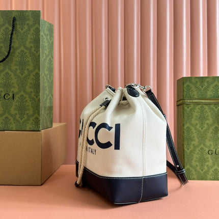 DRAWSTRING SHOULDER BAG LOGO PRINT 31 IN WHITE CANVAS DARK BLUE CALFSKIN