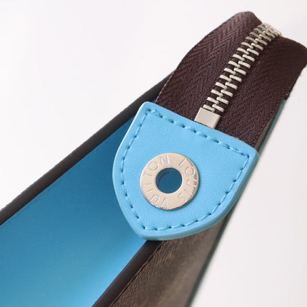 LV 25S POCHETTE VOYAGE 26 IN GASTON BLUE MONOGRAM MACASSAR COATED CANVAS