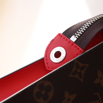 LV 25S POCHETTE VOYAGE 26 IN SARI RED MONOGRAM MACASSAR COATED CANVAS