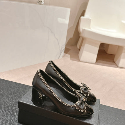 BOWKNOT HIGH HEELS IN BLACK SHEEPSKIN