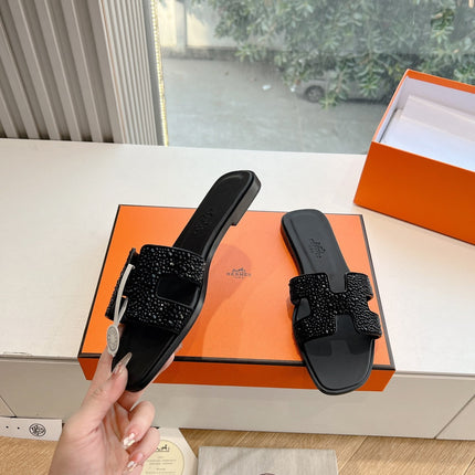 0RAN SLIDE IN BLACK CALFSKIN WITH CRYSTALS