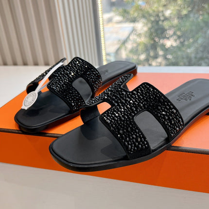 0RAN SLIDE IN BLACK CALFSKIN WITH CRYSTALS