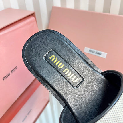 SLIDES SANDALS IN BLACK CALFSKIN AND WHITE STRAW WOVEN