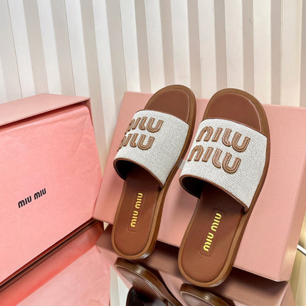 SLIDES SANDALS IN BROWN STRAW WOVEN