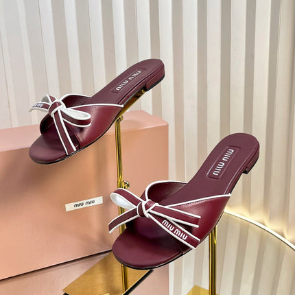 SLIDES SANDALS IN BURGUNDY RED CALFSKIN BOW IN TRAP